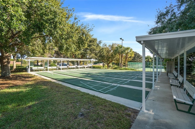 surrounding community featuring a lawn