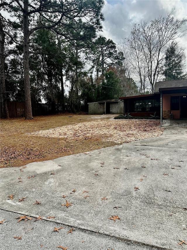 view of yard featuring a carport