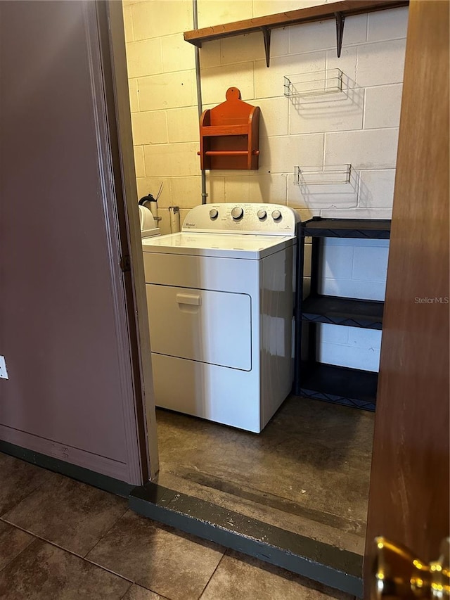 washroom with washer / clothes dryer