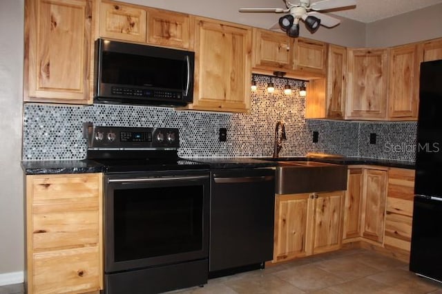 kitchen with sink, ceiling fan, tasteful backsplash, black appliances, and light tile patterned flooring