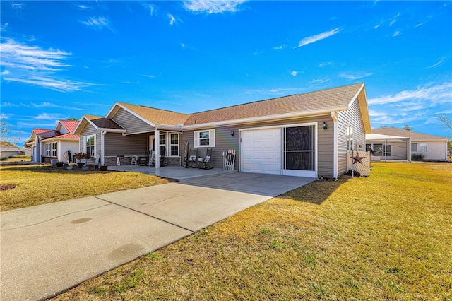 view of front facade featuring a garage and a front yard