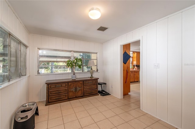 interior space with light tile patterned floors