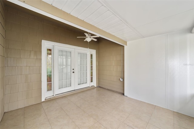 interior space featuring a patio area, french doors, and ceiling fan