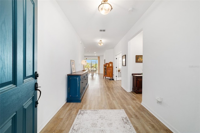 foyer entrance featuring light wood-type flooring