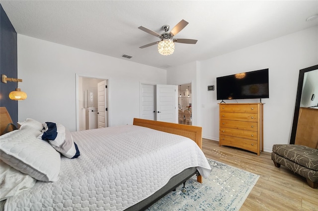 bedroom with ceiling fan and hardwood / wood-style floors