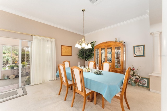 dining area featuring ornate columns, crown molding, light colored carpet, and a notable chandelier