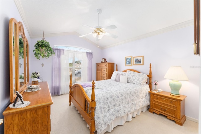 bedroom featuring ornamental molding, lofted ceiling, light carpet, and ceiling fan