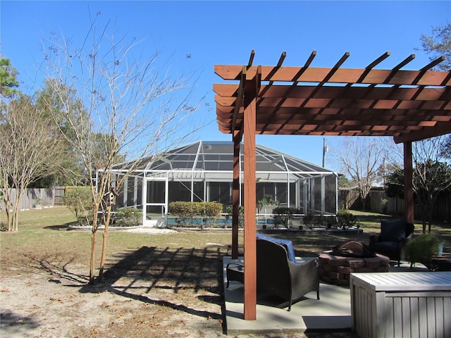 view of patio / terrace with glass enclosure, a pergola, and an outdoor fire pit