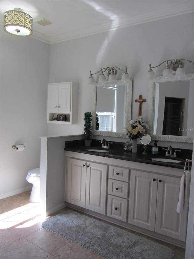 bathroom with vanity, tile patterned floors, and ornamental molding