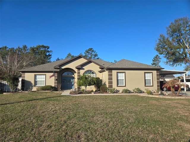 ranch-style home featuring a front yard and a carport