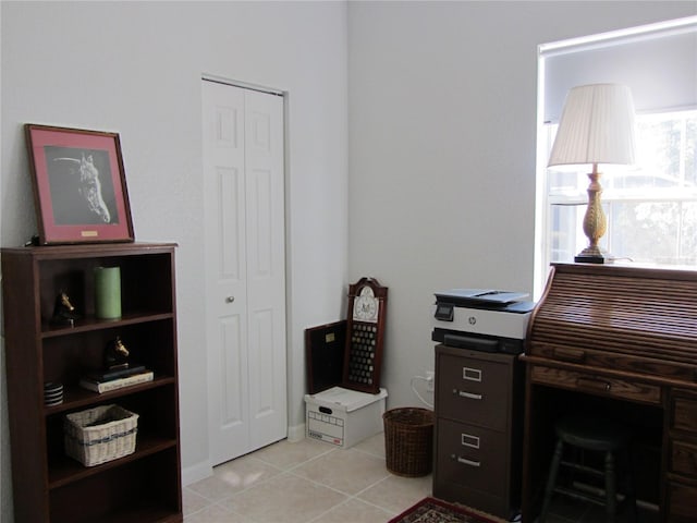 home office with light tile patterned flooring