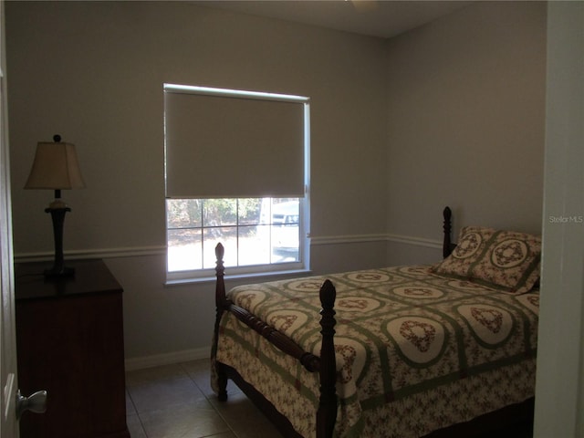 bedroom featuring tile patterned flooring