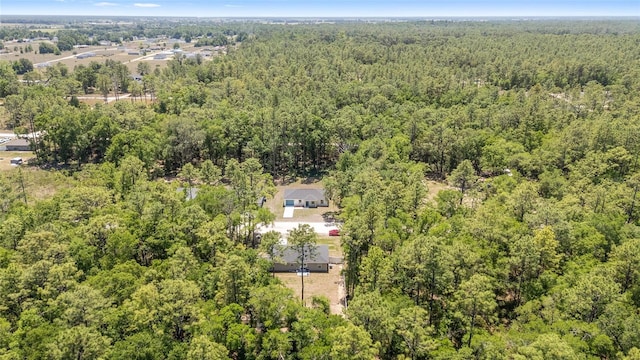bird's eye view featuring a view of trees