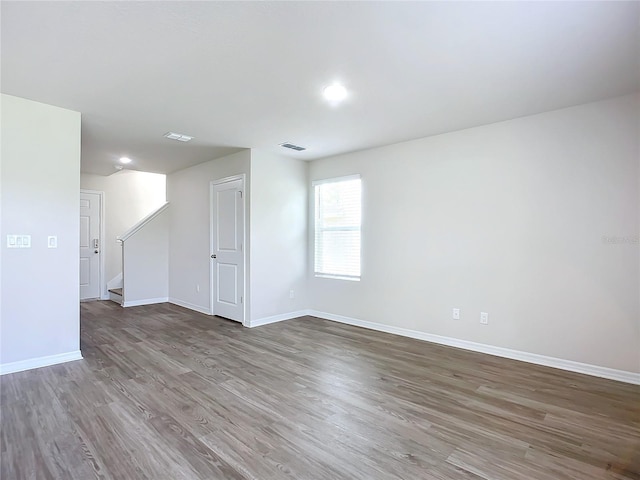 35 Wood Acre Ln, Palm Coast, FL 32164 - empty room featuring hardwood / wood-style floors