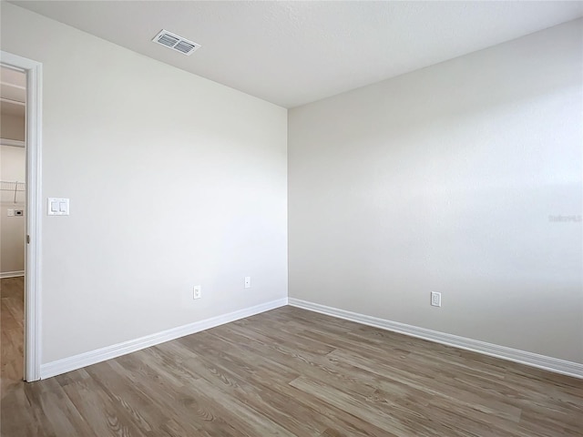 35 Wood Acre Ln, Palm Coast, FL 32164 - unfurnished room with dark wood-type flooring