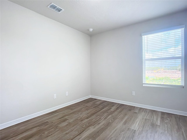 35 Wood Acre Ln, Palm Coast, FL 32164 - empty room featuring hardwood / wood-style flooring