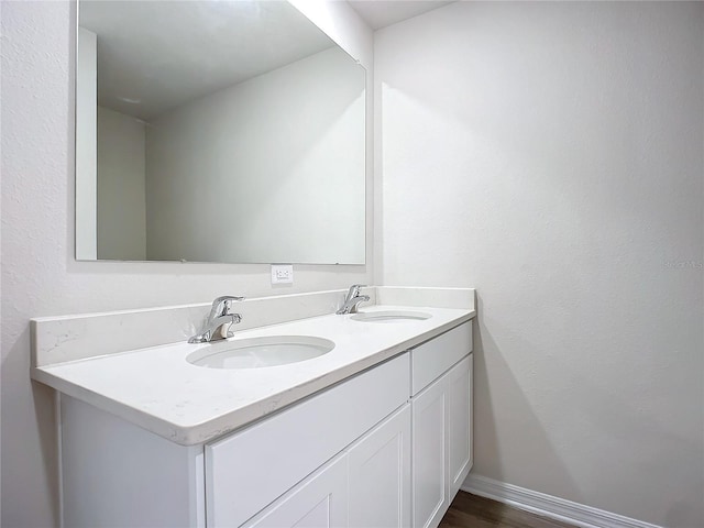 35 Wood Acre Ln, Palm Coast, FL 32164 - bathroom with vanity and hardwood / wood-style floors