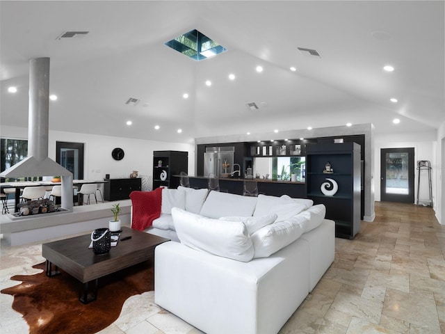 living room with lofted ceiling