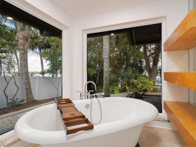 bathroom with a washtub