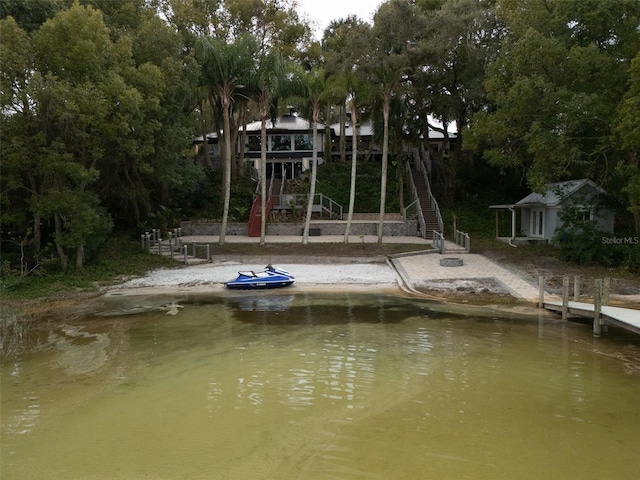 view of play area featuring a water view