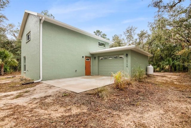 exterior space featuring a garage