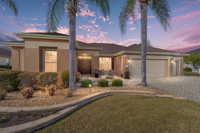 view of front of property with a garage