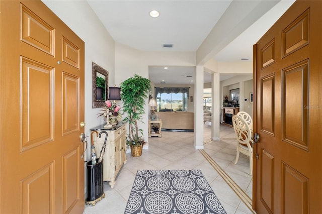 entrance foyer with recessed lighting, visible vents, and light tile patterned flooring