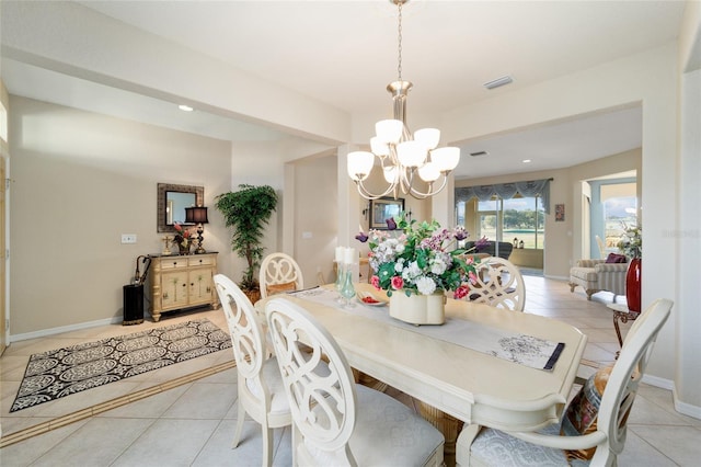 dining area with a notable chandelier, recessed lighting, visible vents, light tile patterned flooring, and baseboards