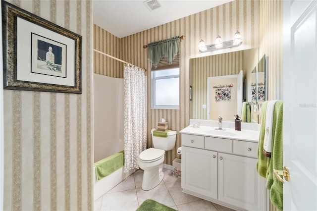 full bath featuring toilet, vanity, visible vents, tile patterned floors, and wallpapered walls