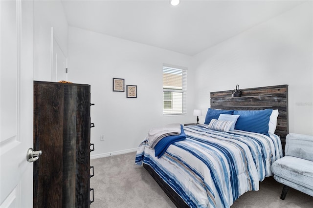 bedroom with light carpet