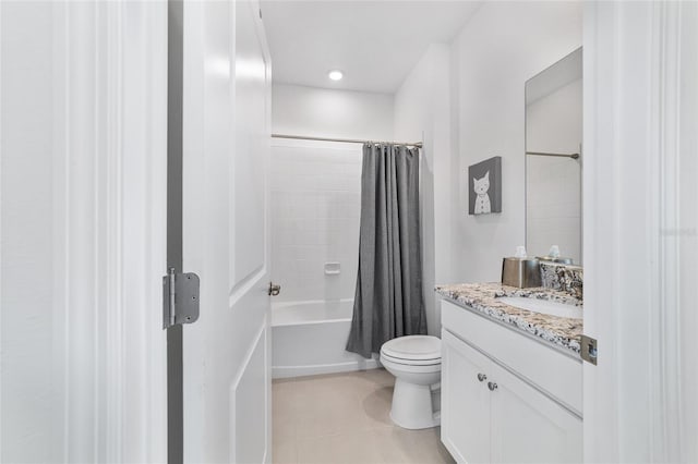 full bathroom featuring shower / bath combo, vanity, tile patterned floors, and toilet