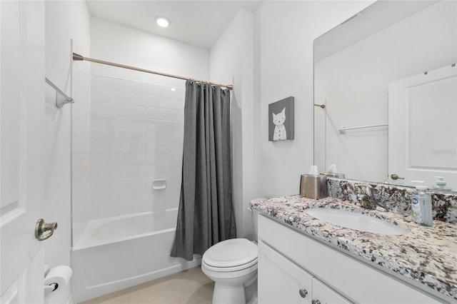 full bathroom featuring vanity, toilet, tile patterned floors, and shower / tub combo with curtain