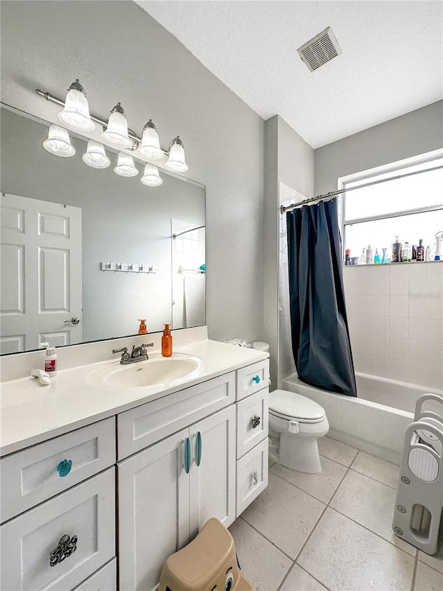 full bathroom featuring toilet, shower / tub combo, a textured ceiling, vanity, and tile patterned flooring