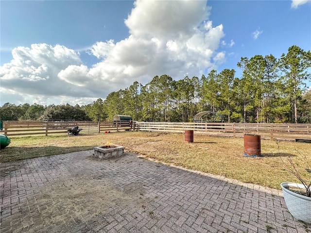 view of patio / terrace with a fire pit