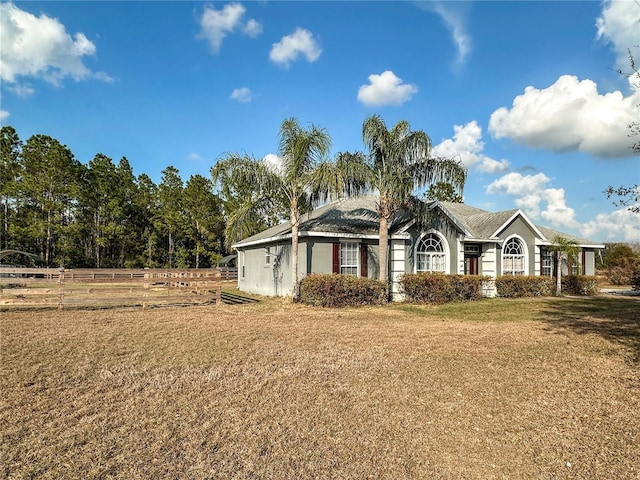 view of front of home with a front lawn