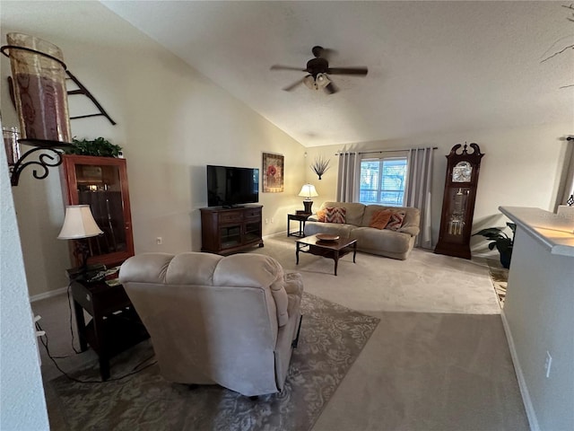 carpeted living room featuring lofted ceiling and ceiling fan