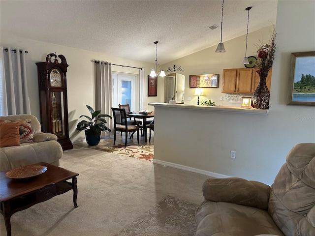 carpeted living room featuring lofted ceiling and a textured ceiling