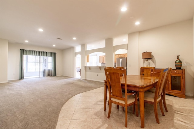 view of carpeted dining space