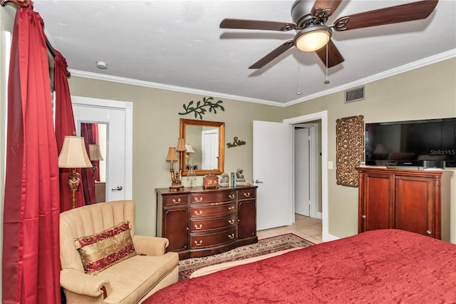 bedroom with crown molding, ceiling fan, and light tile patterned floors