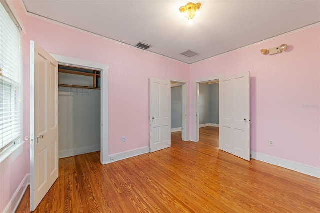 unfurnished bedroom featuring light hardwood / wood-style flooring