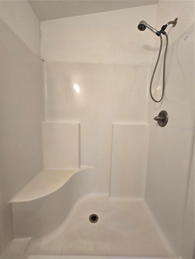 bathroom with walk in shower