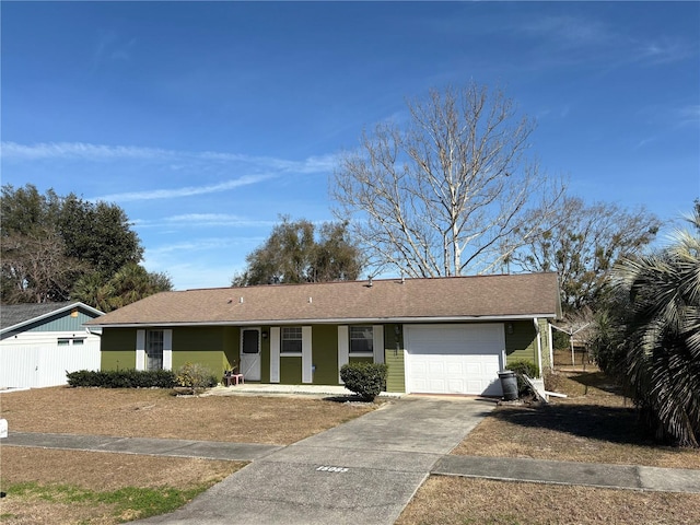 ranch-style home with a garage