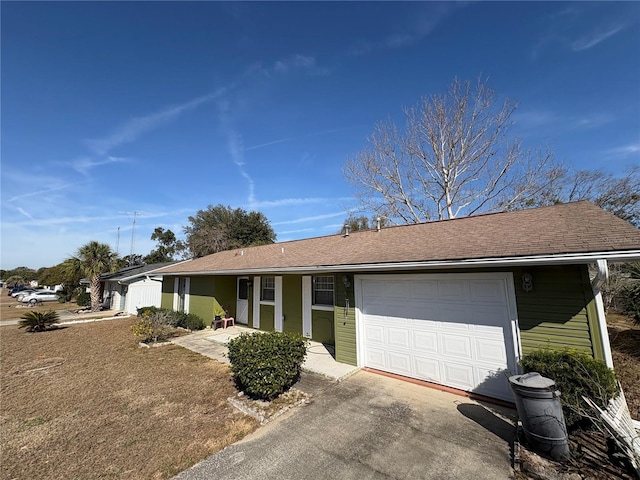 ranch-style house with a garage