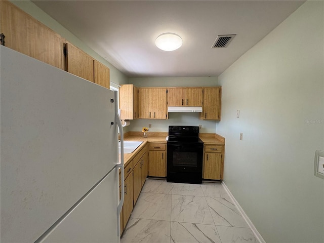 kitchen with black / electric stove and white fridge