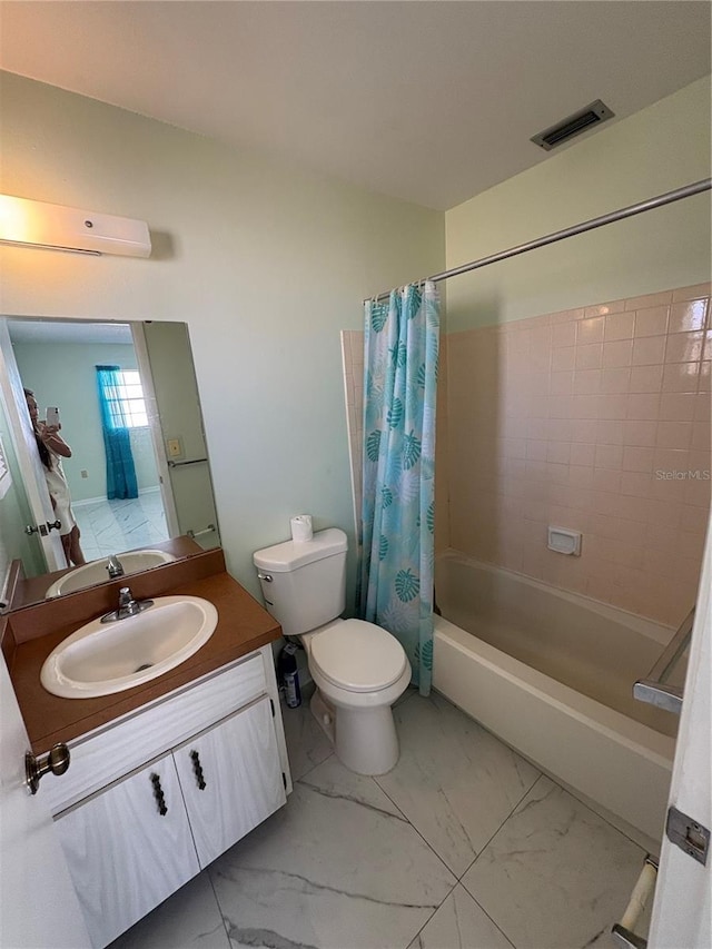 full bathroom featuring toilet, vanity, and shower / bathtub combination with curtain