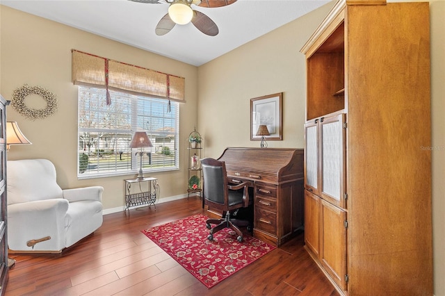 office featuring dark wood-type flooring and ceiling fan