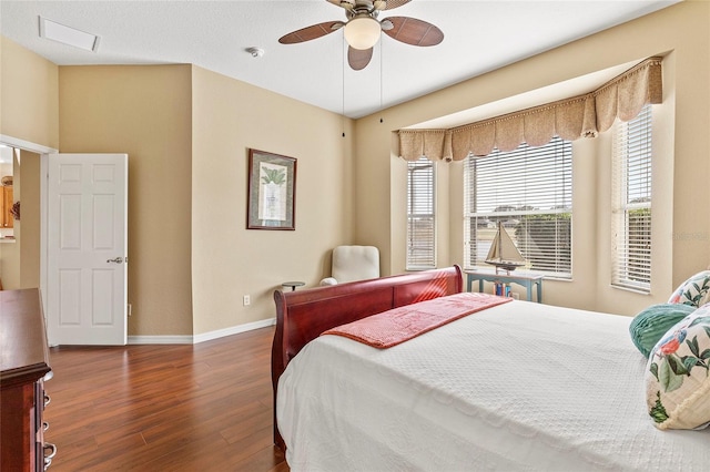 bedroom featuring dark wood-type flooring and ceiling fan