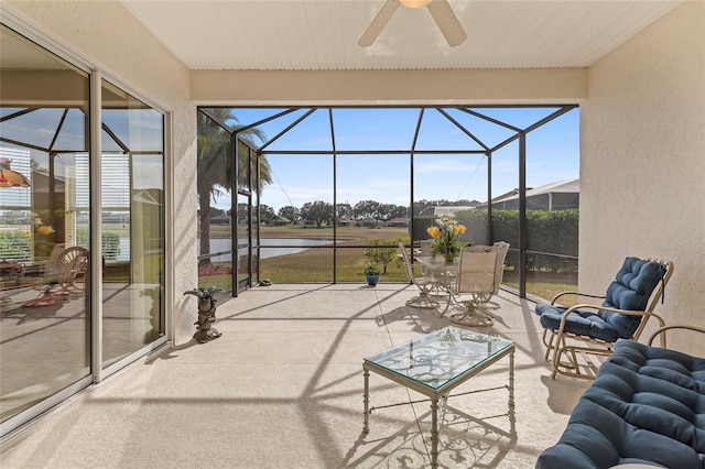 sunroom / solarium with ceiling fan