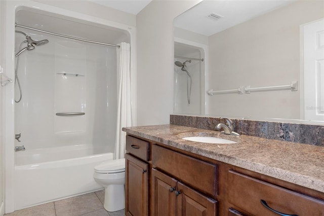 bathroom with visible vents, toilet, shower / bath combo, vanity, and tile patterned floors