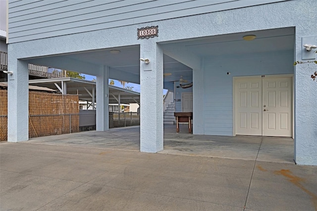 garage featuring fence